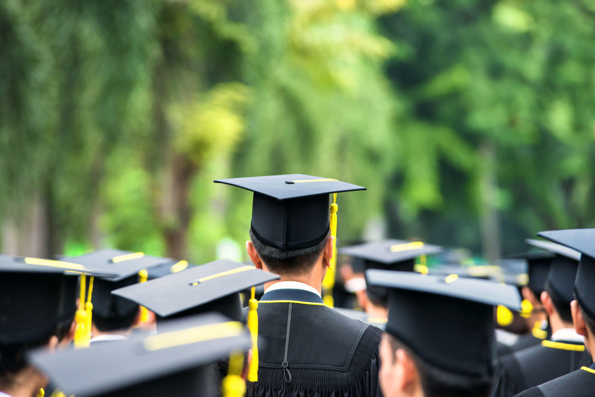 Tall Graduate in a Crowd